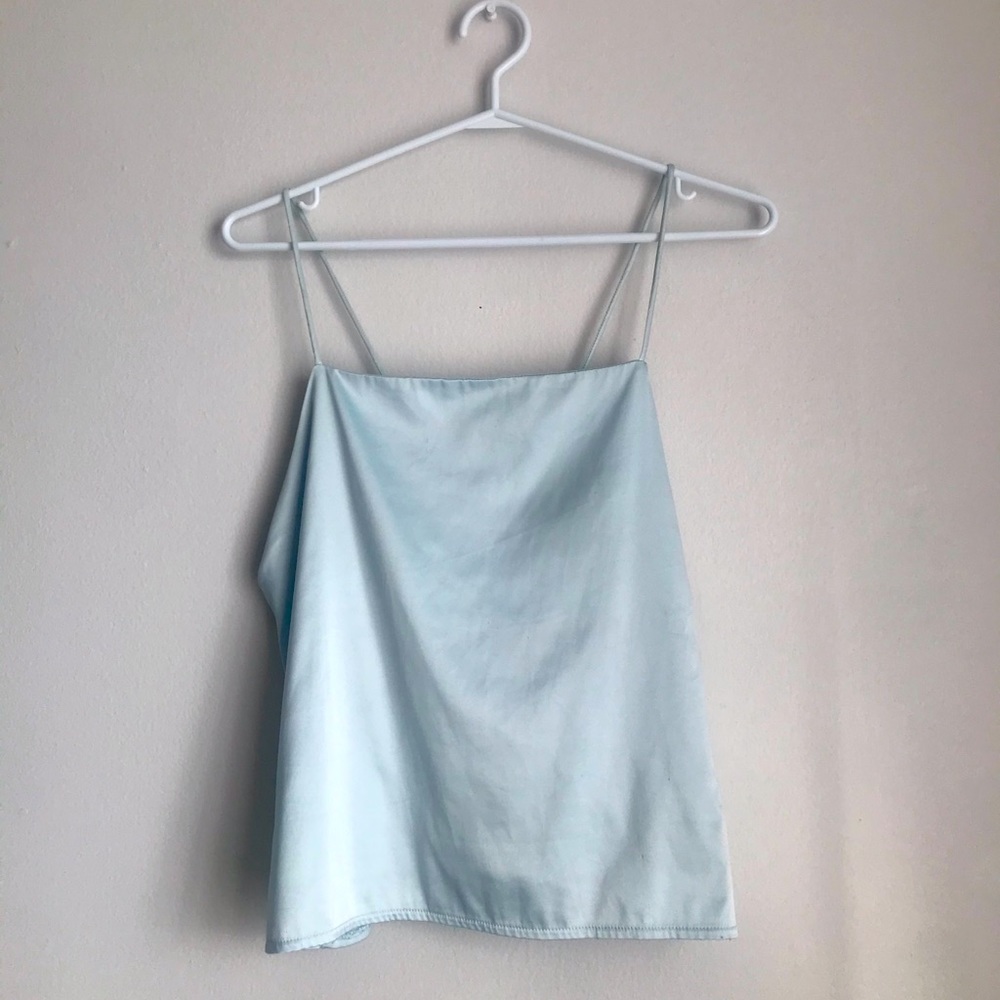 Light blue camisole with dainty straps.